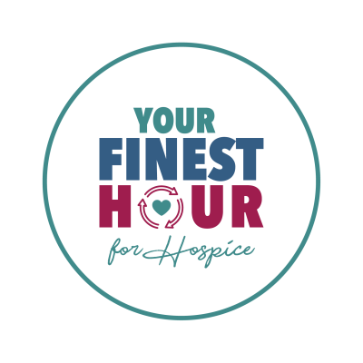 A circular logo with the words Your Finest Hour for Hospice, designed for Mayo Roscommon Hospice. The letter O in Hour contains a heart and circular arrows, symbolising compassion and continuity. The text features teal, blue, and burgundy colours.