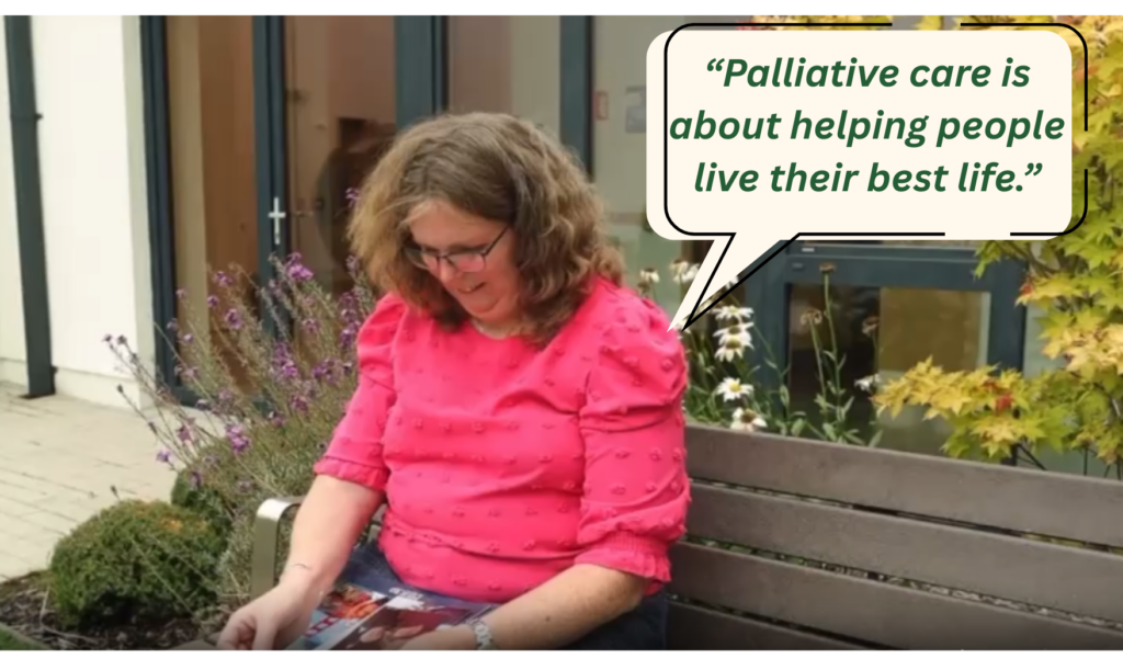 A woman in a pink shirt sits on a bench outside, looking at a photo. A speech bubble says, “Palliative care with Mayo Roscommon Hospice is about helping people live their best life.”.