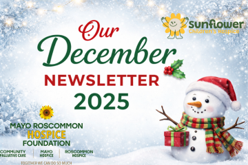 A festive snowman with a scarf stands by a wrapped present in the snow. Text reads: Our December Newsletter 2025 with Sunflower Children's Hospice logo and Mayo Roscommon Hospice Foundation logos, celebrating the warmth and hope shared by Mayo Roscommon Hospice this season. Snow falls in the background.