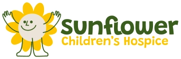 Logo for Sunflower Children’s Hospice, designed in partnership with Mayo Roscommon Hospice, showing a smiling sunflower character with raised arms and the text “Sunflower Children’s Hospice” in green and yellow.